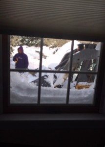 Through the window I could see a plow, and small loader piece of equipment. They dug for hours.