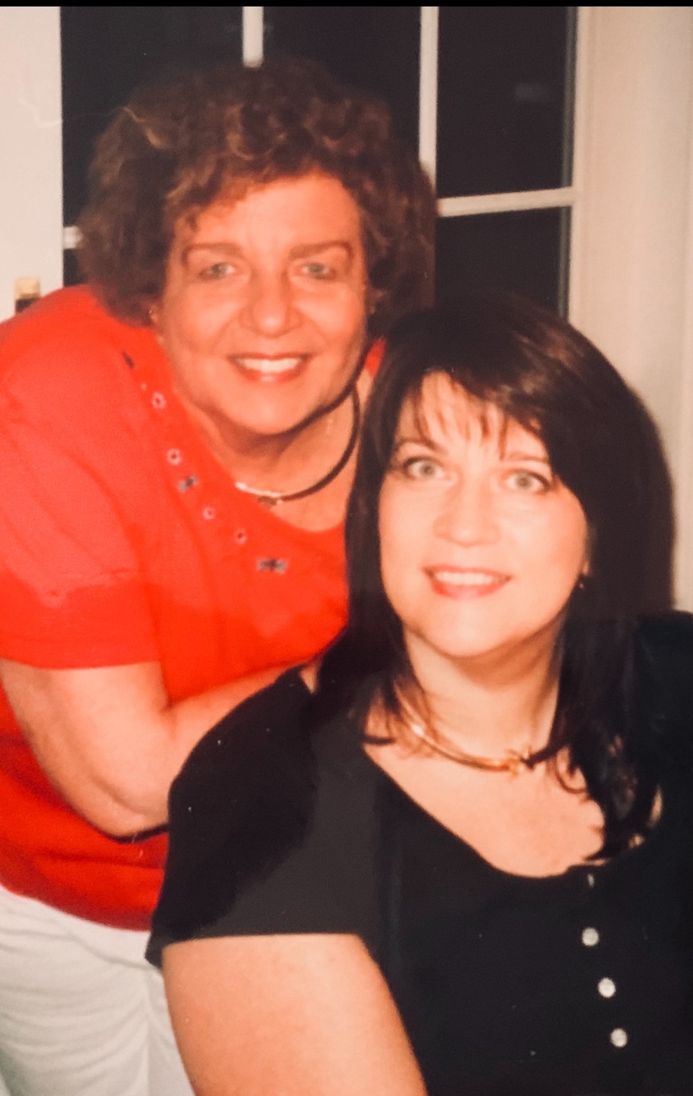 Mom with me weeks after my paralysis.